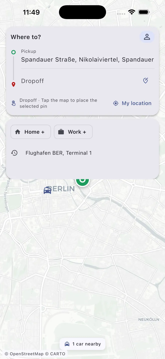 The Fairgo rider app open on a map of Berlin, with pickup and drop-off fields and one car nearby.